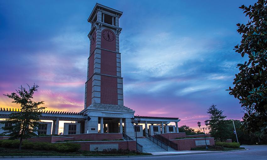 默尔顿塔 with a multi colored sky in background